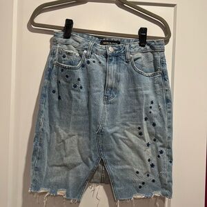 Neon Blonde distressed denim skirt with stars. Size 26.